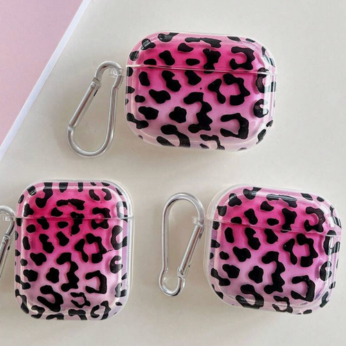 Pink leopard print airpod cases with carabiners on a light pink background