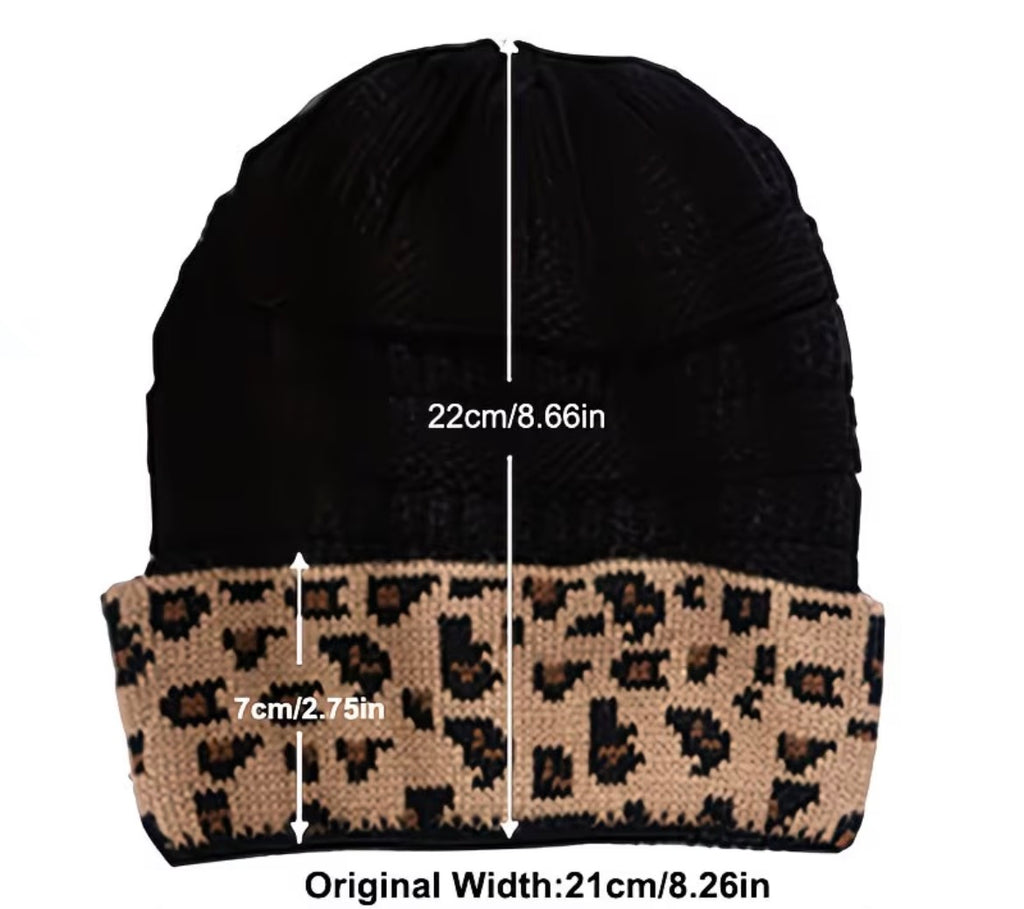 Black beanie with leopard print cuff, showing measurements on a white background