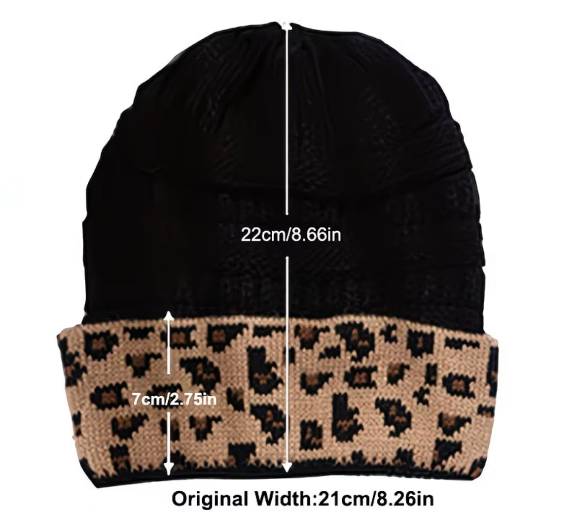 Black beanie with leopard print cuff, showing measurements on a white background