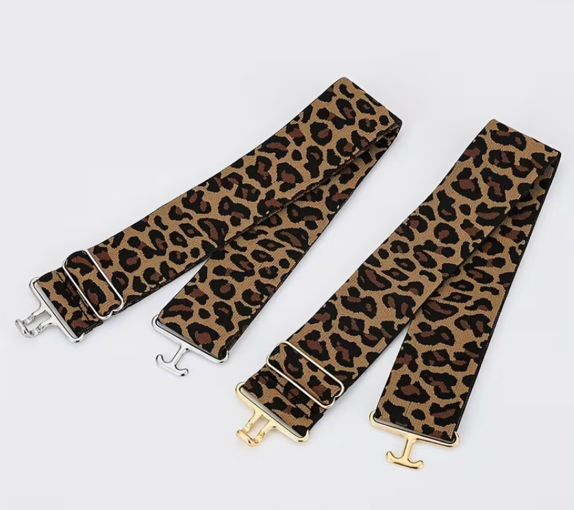 Leopard print equestrian belt on a light gray background