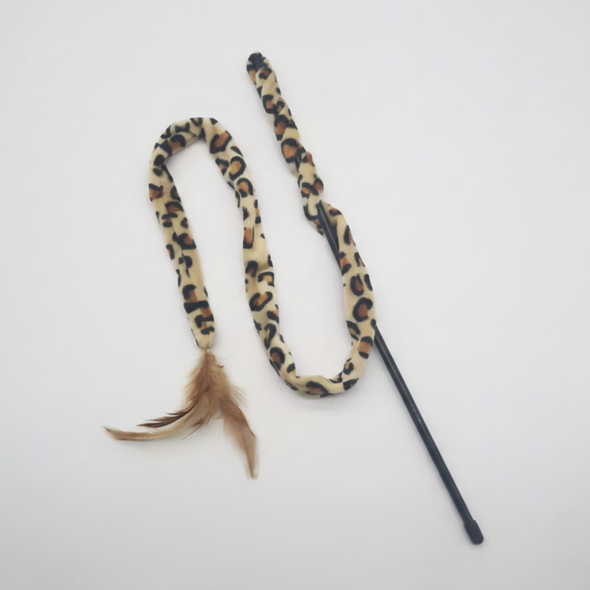 Leopard print cat toy with a feather on a white background