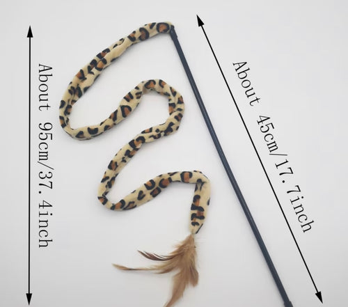 Leopard print cat toy with a measuring stick on a white background
