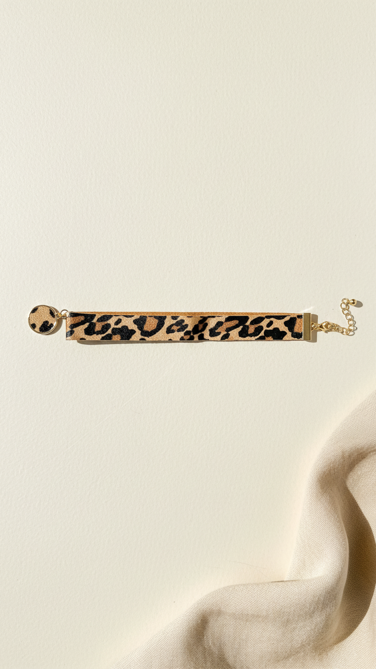 Leopard print chokeron a beige background