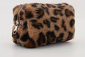 Leopard print makeup bag on a white background