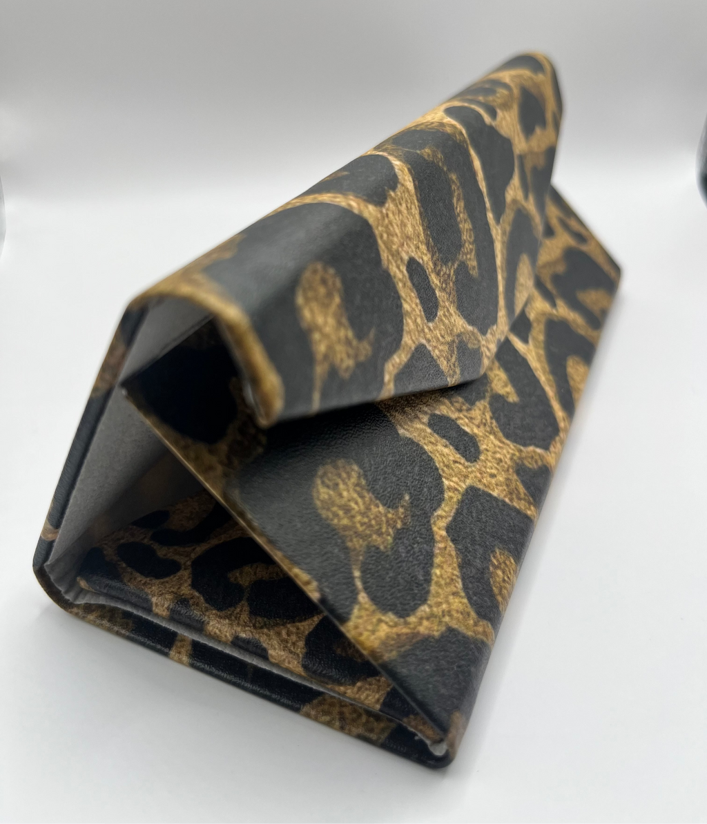 Leopard print cover folded on a white background