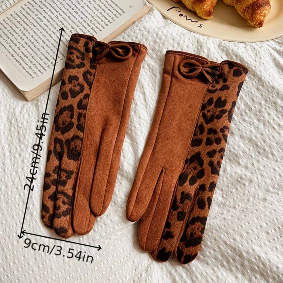 Pair of brown gloves with leopard print cuffs on a white surface, with measurements indicated.