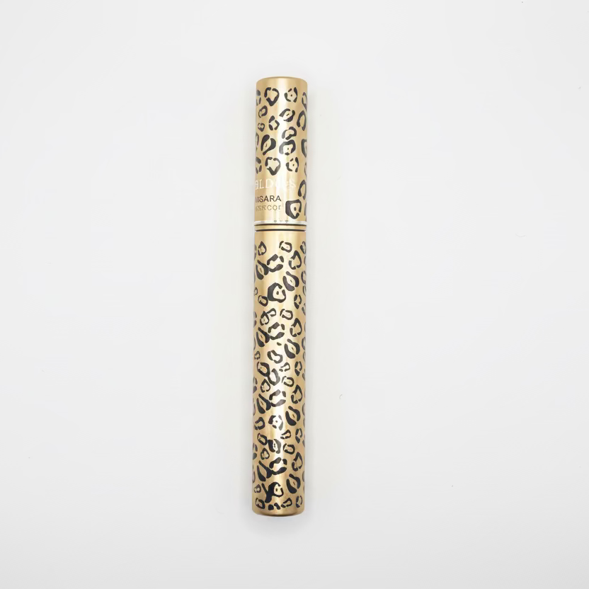 Mascara with leopard print design on a white background