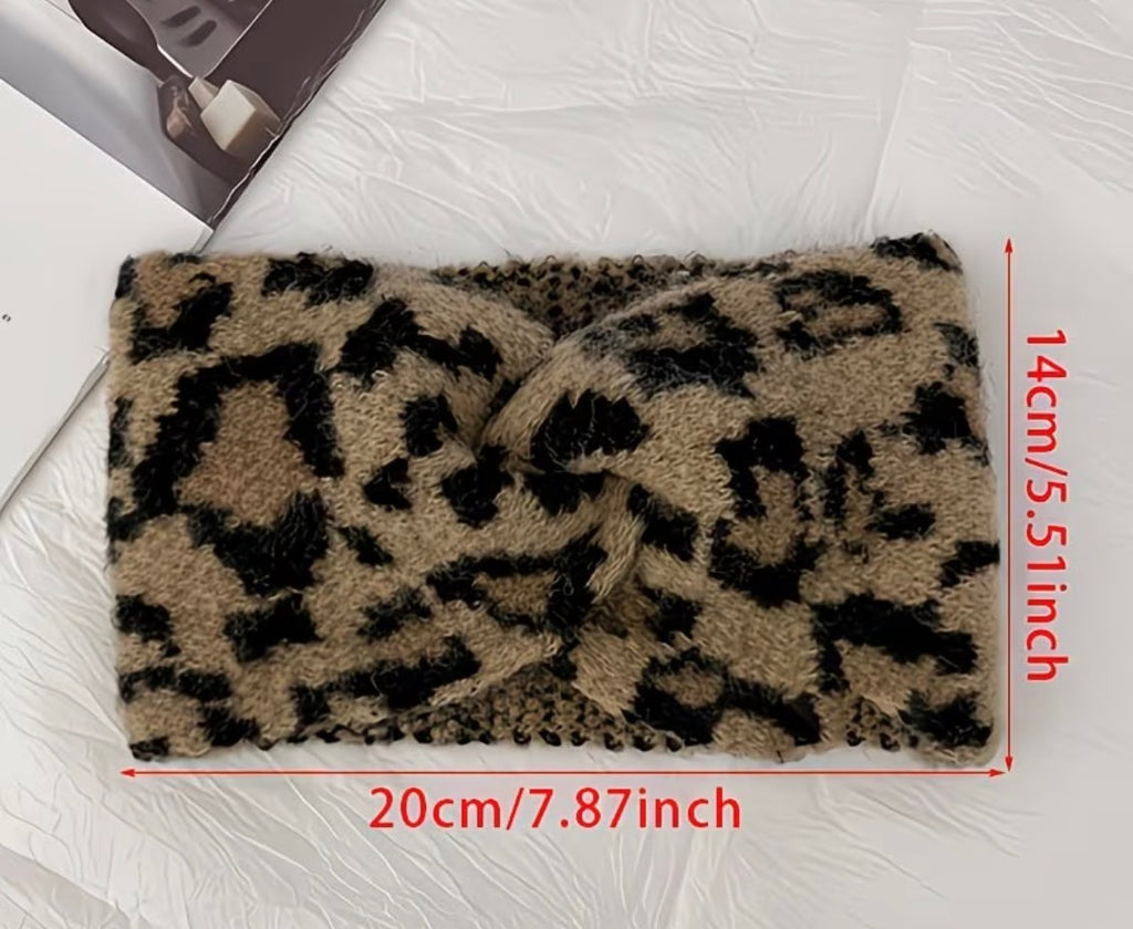 Leopard print headband with measurements on a white background