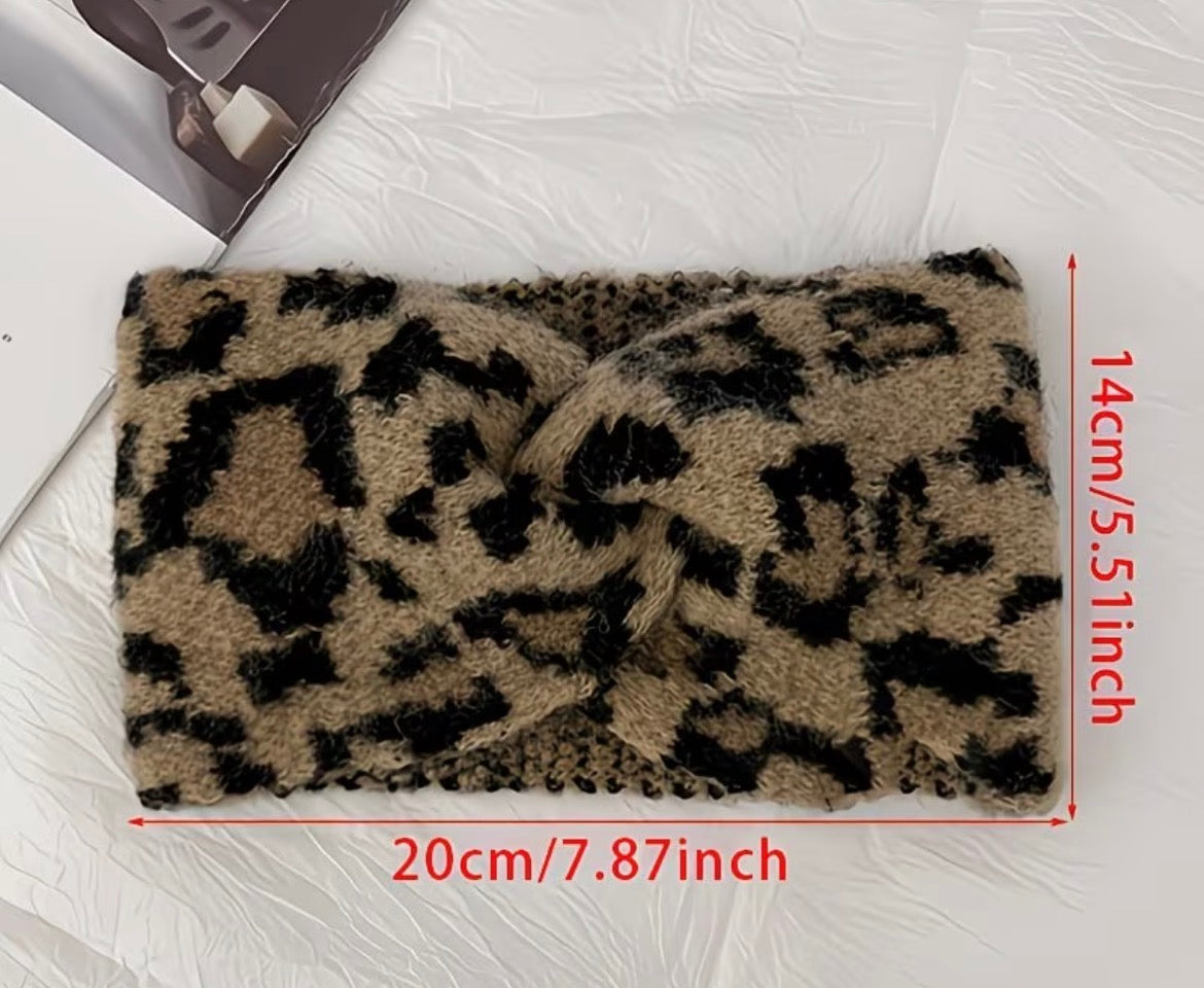 Leopard print headband with measurements on a white background