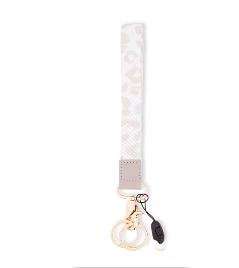 White lanyard with keychain attachment on a white background