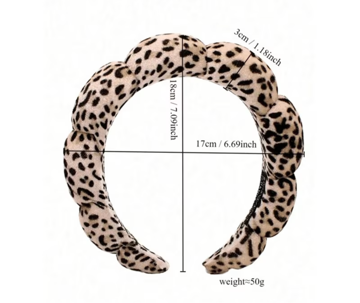 Leopard print headband with measurements on a white background