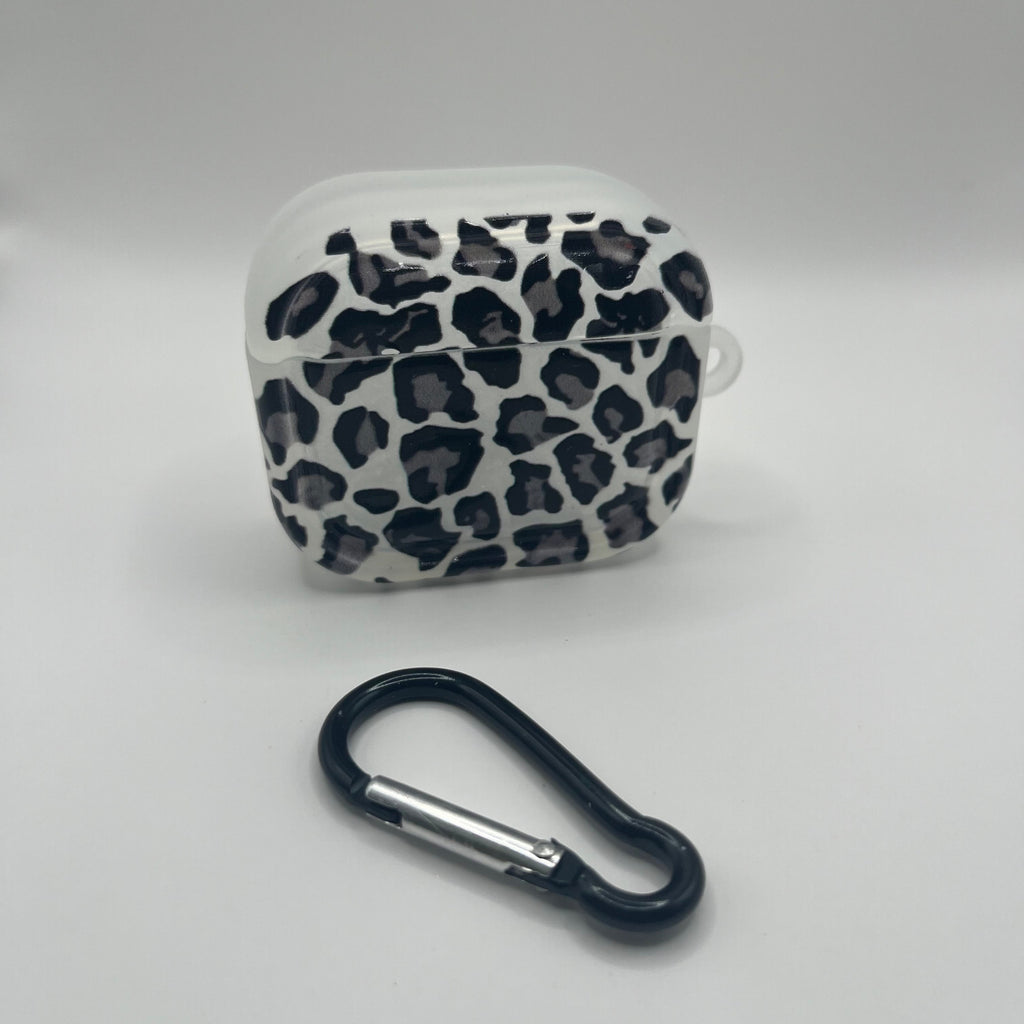 Leopard print case with a carabiner on a gray background