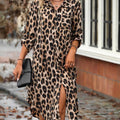 Woman wearing a leopard print dress with 'Emery Rose' branding.