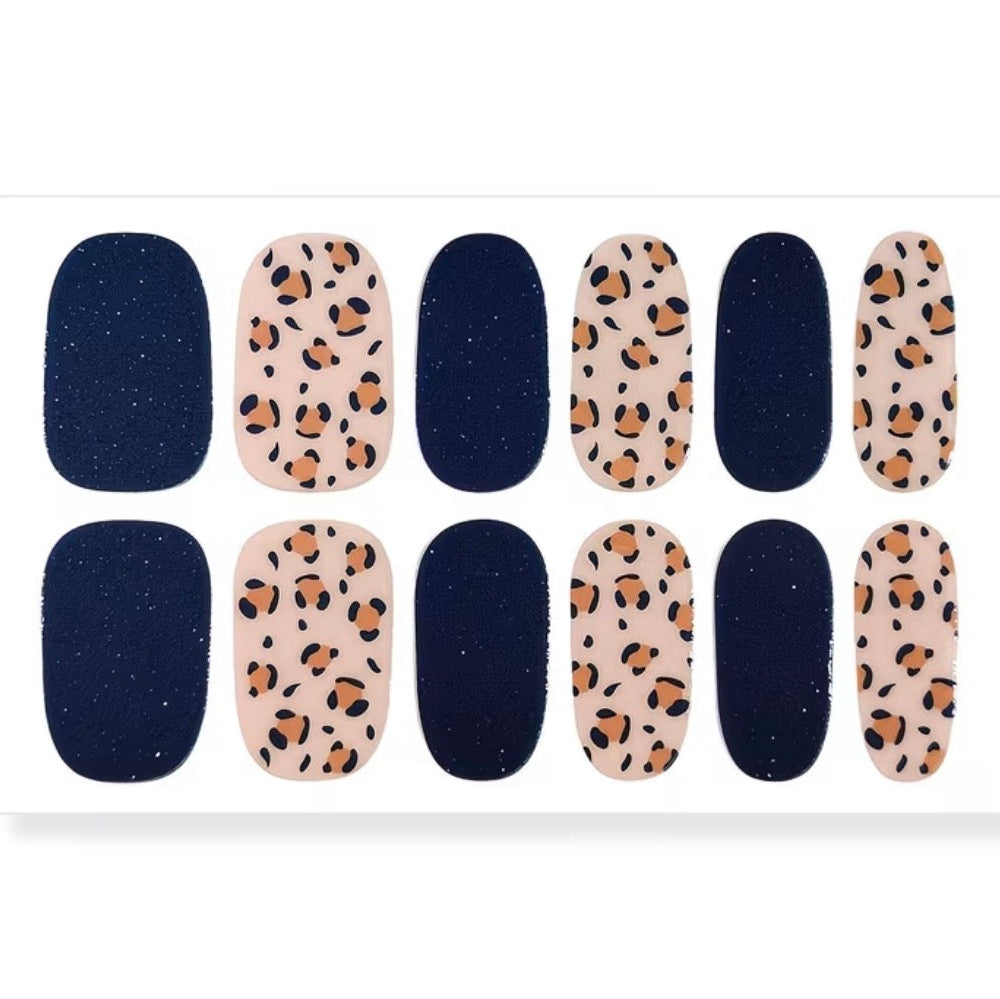 Set of nail art stickers with navy and leopard print designs on a white background