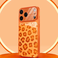Phone case with leopard print design on an orange background