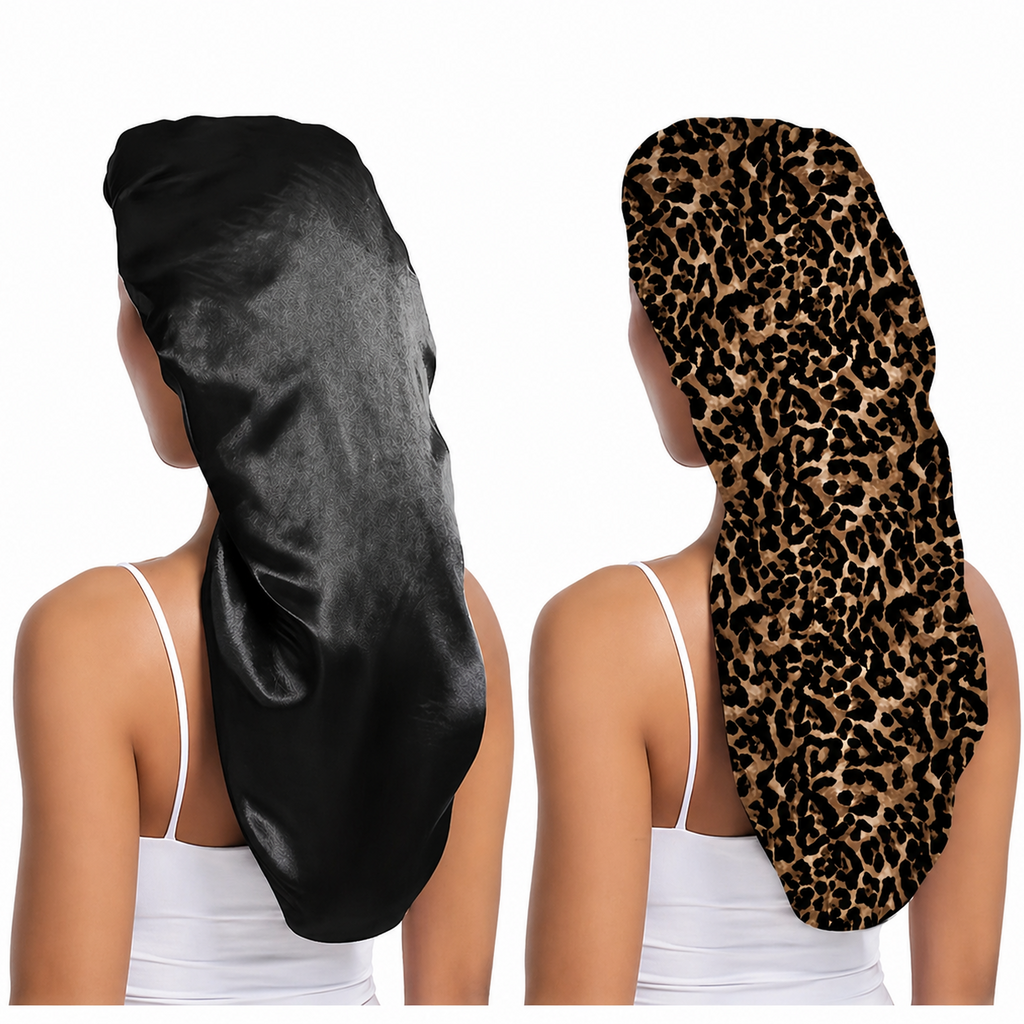 Two satin sleep caps, one black and one leopard print, worn by a model on a white background.